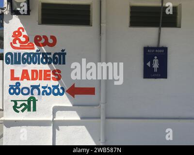 Ladies Toilet signage in multiple languages in India. Washroom signs and directions for Female in English, Hindi, Kannada, Tamil and Telugu Stock Photo