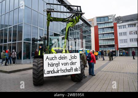 Farmer protest, denounce government plan for abolish agricultural diesel and vehicle tax exemptions, demonstration with tractors in the city of Trier, Stock Photo