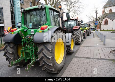 Farmer protest, denounce government plan for abolish agricultural diesel and vehicle tax exemptions, demonstration with tractors in the city of Trier, Stock Photo