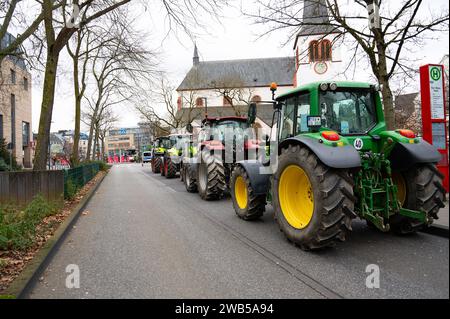 Farmer protest, denounce government plan for abolish agricultural diesel and vehicle tax exemptions, demonstration with tractors in the city of Trier, Stock Photo