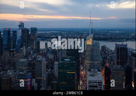 Panoramic view of Manhattan from the Summit overlook towards the Hudson River, with Hudson Yards in the background and the city at sunset Stock Photo