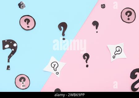 Different question marks on color background Stock Photo