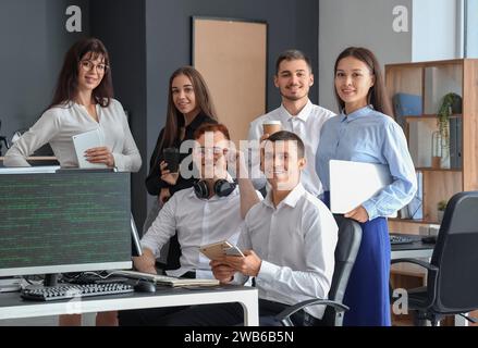 Team of young programmers working in office Stock Photo