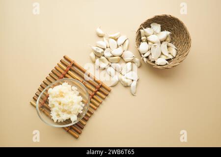 top view of minced garlic in a bowl on table  Stock Photo