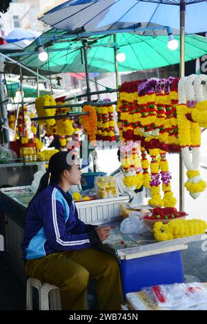 Flower garlands sold by the Sri Maha Mariamman Temple on Silom Road, Bangkok, Thailand. Stock Photo