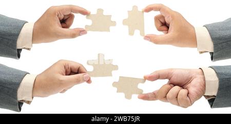 Collection of business hand holding a single piece of puzzle isolated over white background. Teamwork and partnership concept Stock Photo
