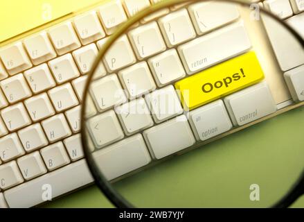 Closeup view of words of Oops on the computer keyboard button. Mistake concept Stock Photo