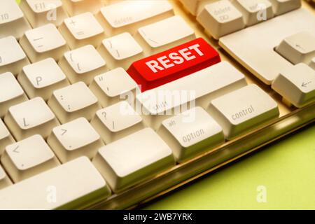 Closeup view of words of Reset on the computer keyboard button. New beginning of life, business or career concept Stock Photo