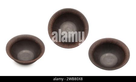 Ceramic empty brown bowl isolated on white background. Stock Photo