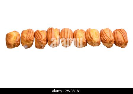 Sweet eclairs isolated on a white background. Top view. Stock Photo