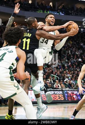 Milwaukee, USA. 9th Jan, 2024. Utah Jazz guard Kris Dunn vies against Milwaukee Bucks forward Giannis Antetokounmpo (R) during the NBA regular season game between Milwaukee Bucks and Utah Jazz in Milwaukee, the United States, Jan. 9, 2024. Credit: Joel Lerner/Xinhua/Alamy Live News Stock Photo