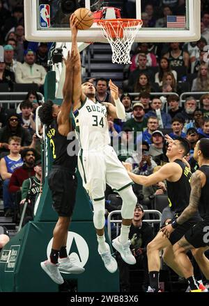 Milwaukee, USA. 9th Jan, 2024. Milwaukee Bucks forward Giannis Antetokounmpo (C) goes to the basket during the NBA regular season game between Milwaukee Bucks and Utah Jazz in Milwaukee, the United States, Jan. 9, 2024. Credit: Joel Lerner/Xinhua/Alamy Live News Stock Photo