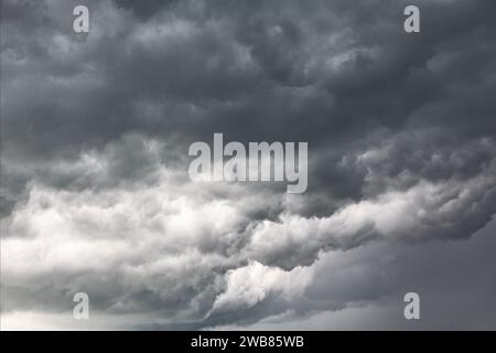 Dark and Dramatic Storm Clouds Area. Background Great For Any Use Stock Photo