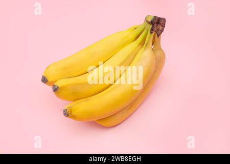Fresh bananas on pink background. top view Stock Photo