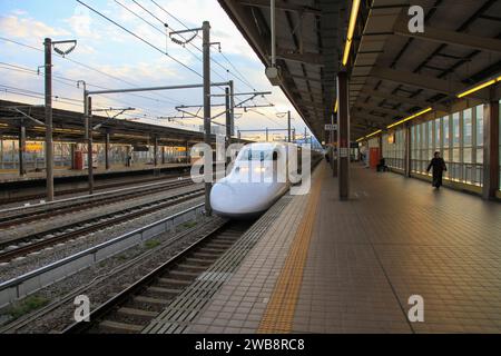 A Shinkansen N700 bullet train arriving at Shin-Fuji train station. Stock Photo