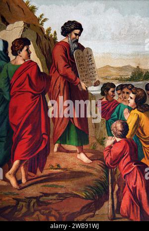 Illustration of Moses Descending Mount Sinai holding the Tablets of the Covenant (Exodus) from Antique Illustrated Family Bible Stock Photo