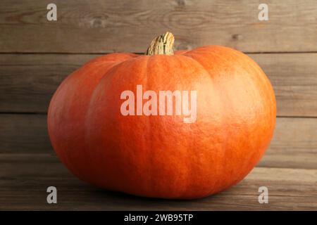 Fresh orange pumpkin on grey background. Top view Stock Photo
