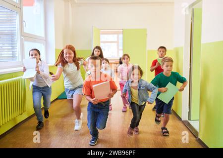 Group of classmate running in corridor at school Stock Photo - Alamy