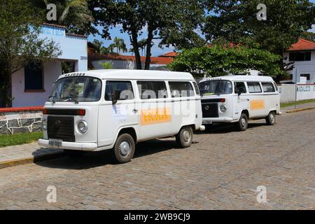 MORRETES, BRAZIL - OCTOBER 8, 2014: Classic VW Transporter vans used as school buses in Morretes, Brazil. Stock Photo