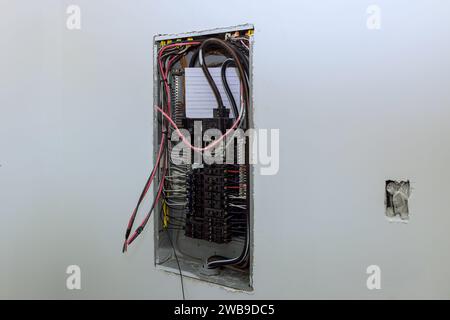 Switch box for electrical power control mounted on wooden frame beams at wall Stock Photo