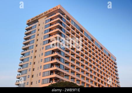 BANGKOK, THAILAND - DECEMBER 21, 2013: Mandarin Oriental hotel in Bangkok in sunset light. Mandarin Oriental Hotel Group focuses on luxury properties. Stock Photo