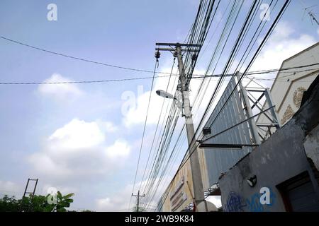 chaos in electrical cables, tangles in the city's electricity supply system. Stock Photo