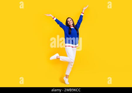 Full body photo of optimistic promoter girl wear blue sweatshirt jeans ...