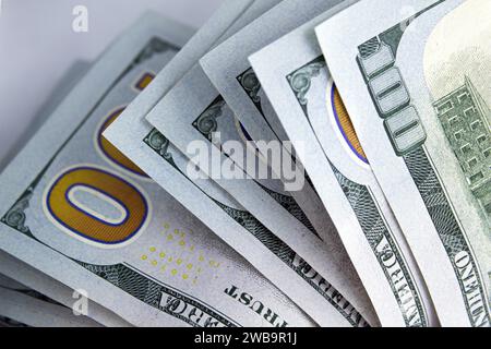 Close up view of one hundred dollar bills isolated on white background Stock Photo