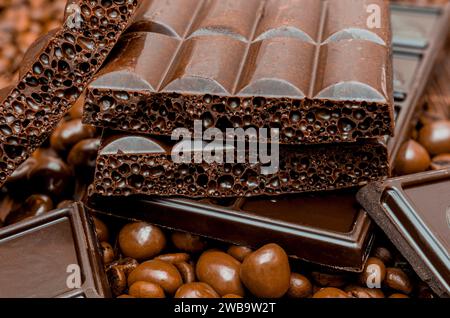 Different types of chocolate, porous and dark, glossy chocolate balls, close-up Stock Photo