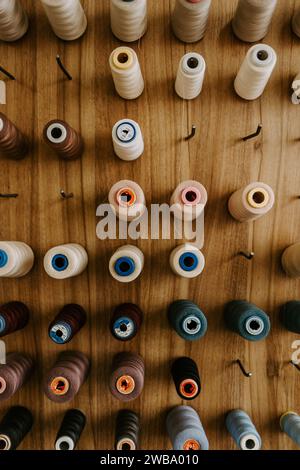 Sewing threads as a multicolored background close up Stock Photo