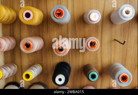 Sewing threads as a multicolored background close up Stock Photo