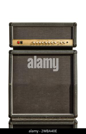 Big retro styled guitar amplifier speaker cabinet and control head isolated on a white background Stock Photo