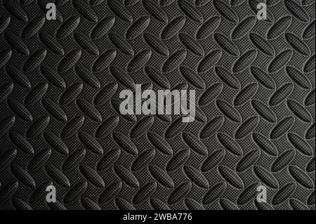 Black durable gradient background. Surface of industrial plastic panel Stock Photo