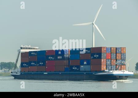 Rotterdam, Netherlands - May 28 2017: Inland container vessel Comienzo transporting cargo in Rotterdam Stock Photo