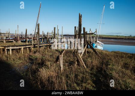 Skippool creek wooden moorings for boats on the river Wyre Lancashire UK Stock Photo