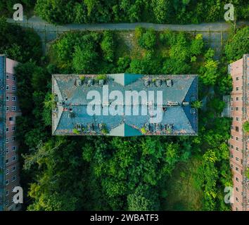 Abandoned military barracks, photographed by a drone while nature takes it slowly back Stock Photo