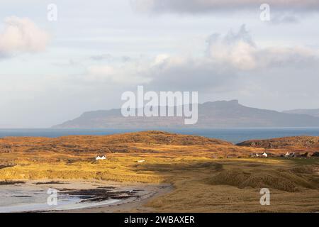 Sanna Bay in Ardnamurchan on the far west coast of Scotland with the   Isle of Eigg in the background. Stock Photo