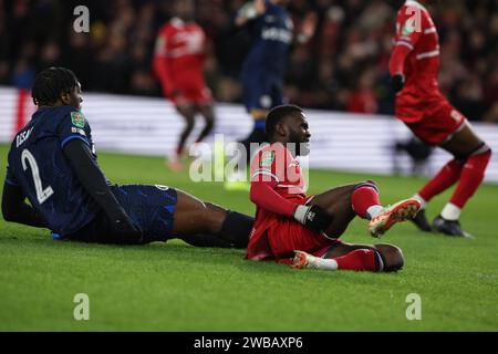 Emmanuel Latte Lath of Middlesbrough injured In action with Axel Disasi ...