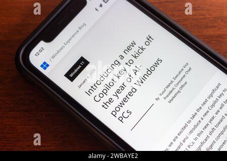 Vancouver, CANADA - Jan 8 2024 : A blog post “Introducing a new Copilot key to kick off the year of AI-powered Windows PCs” seen in an iPhone. Stock Photo