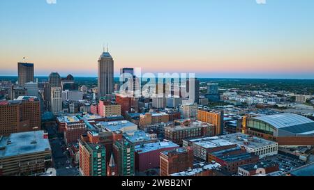 Aerial Evening Cityscape with Skyscrapers and Stadium in Indianapolis Stock Photo