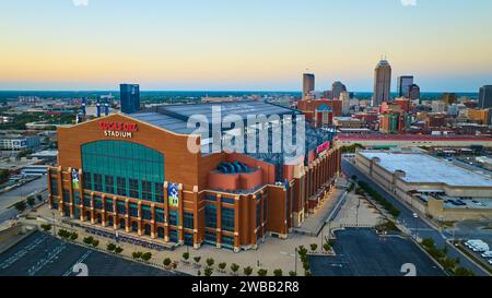 Aerial Golden Hour at Lucas Oil Stadium with Cityscape View Stock Photo
