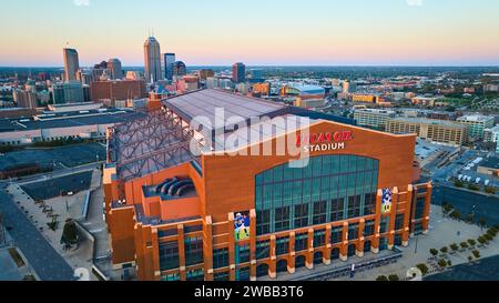 Aerial Golden Hour Glow on Lucas Oil Stadium and Indianapolis Cityscape Stock Photo