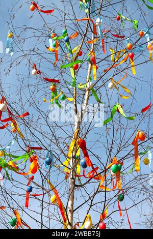 Traditional Czech Easter Tree on blue sky background close-up. Stock Photo