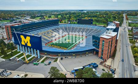 Aerial View of Empty Michigan Stadium with Autumn Backdrop Stock Photo