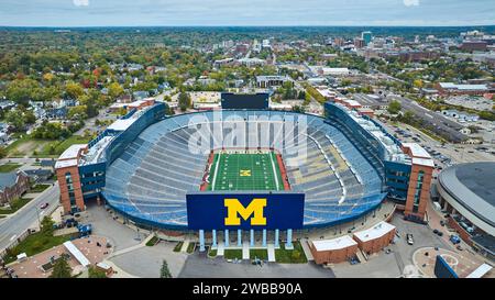 Aerial View of Michigan Stadium with Urban Ann Arbor Background Stock Photo