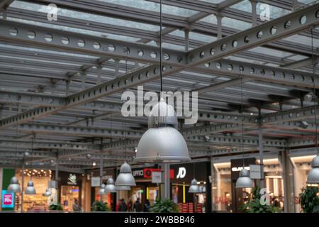 light point in post-industrial shopping center, themed style with factory. Stock Photo