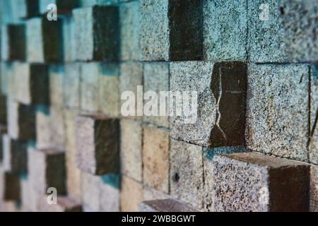 Textured Stone Wall Detail in Monochromatic Gray Stock Photo