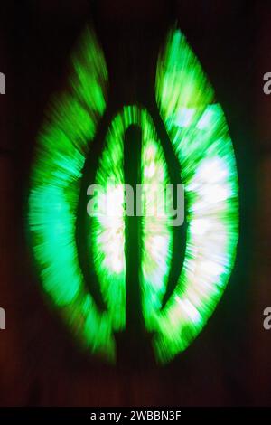 Abstract Green and Yellow Light Radials on Dark Background Stock Photo