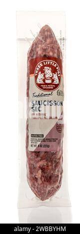 Winneconne, WI - 5 January 2024: A package of three little pigs saucisson sec French style salami on an isolated background. Stock Photo