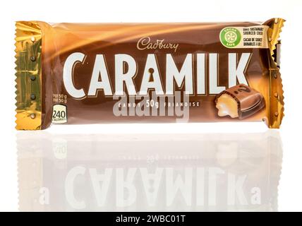 Winneconne, WI - 9 January 2024: A package of Cadbury Caramilk candy bar on an isolated background. Stock Photo